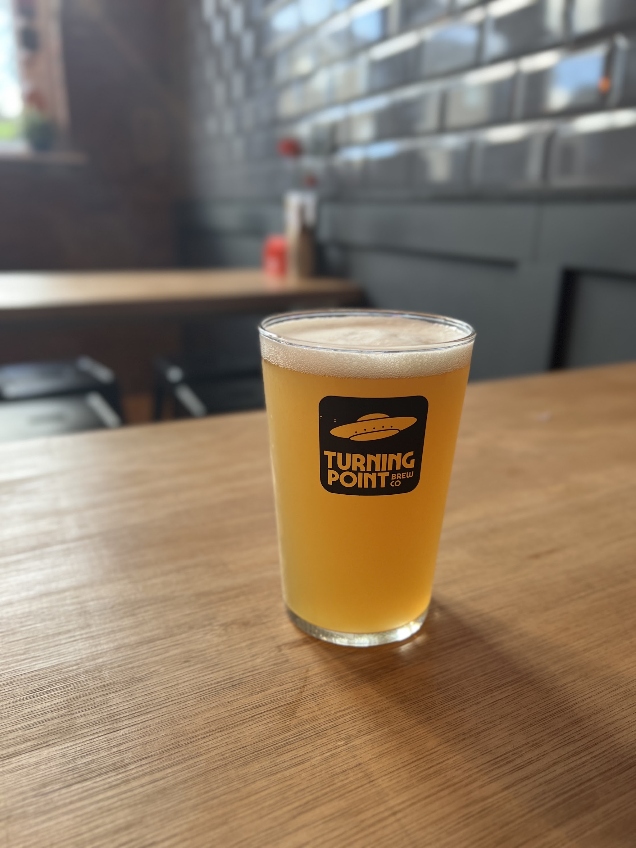 A golden craft beer served at Against The Grain